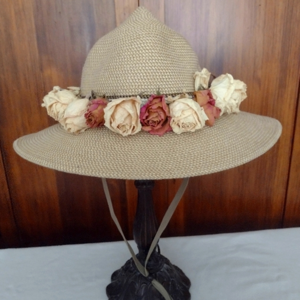 Faux straw hat with dried roses